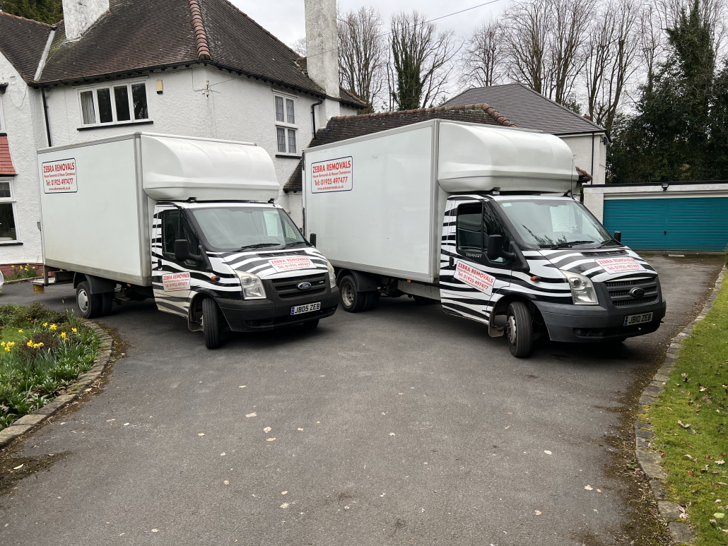 Two vans from Zebra Removals carrying out a house clearance in Southport