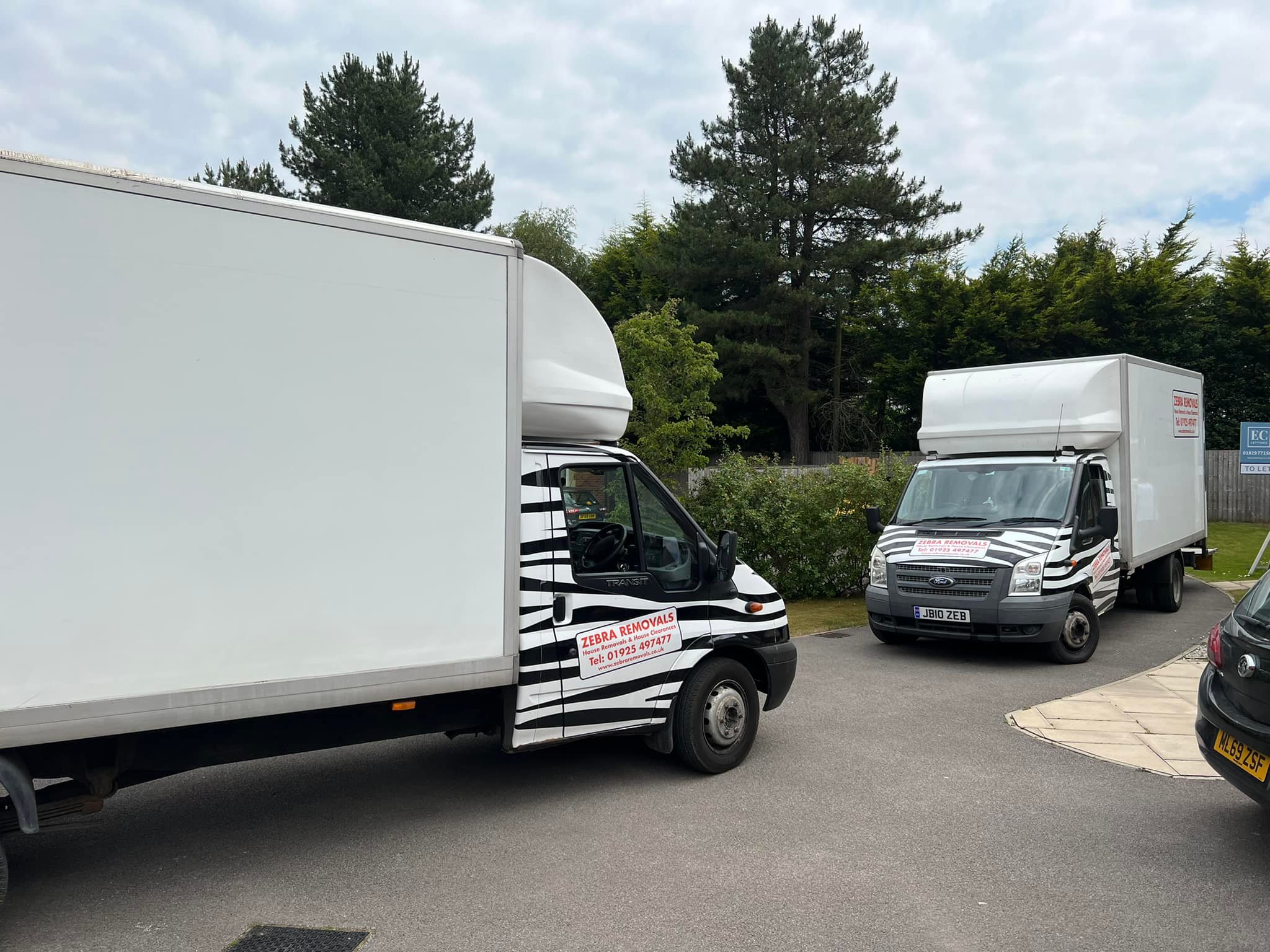 Two vans from Zebra Removals