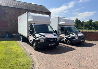 Two Zebra Removals vans on a Cheshire House Clearance