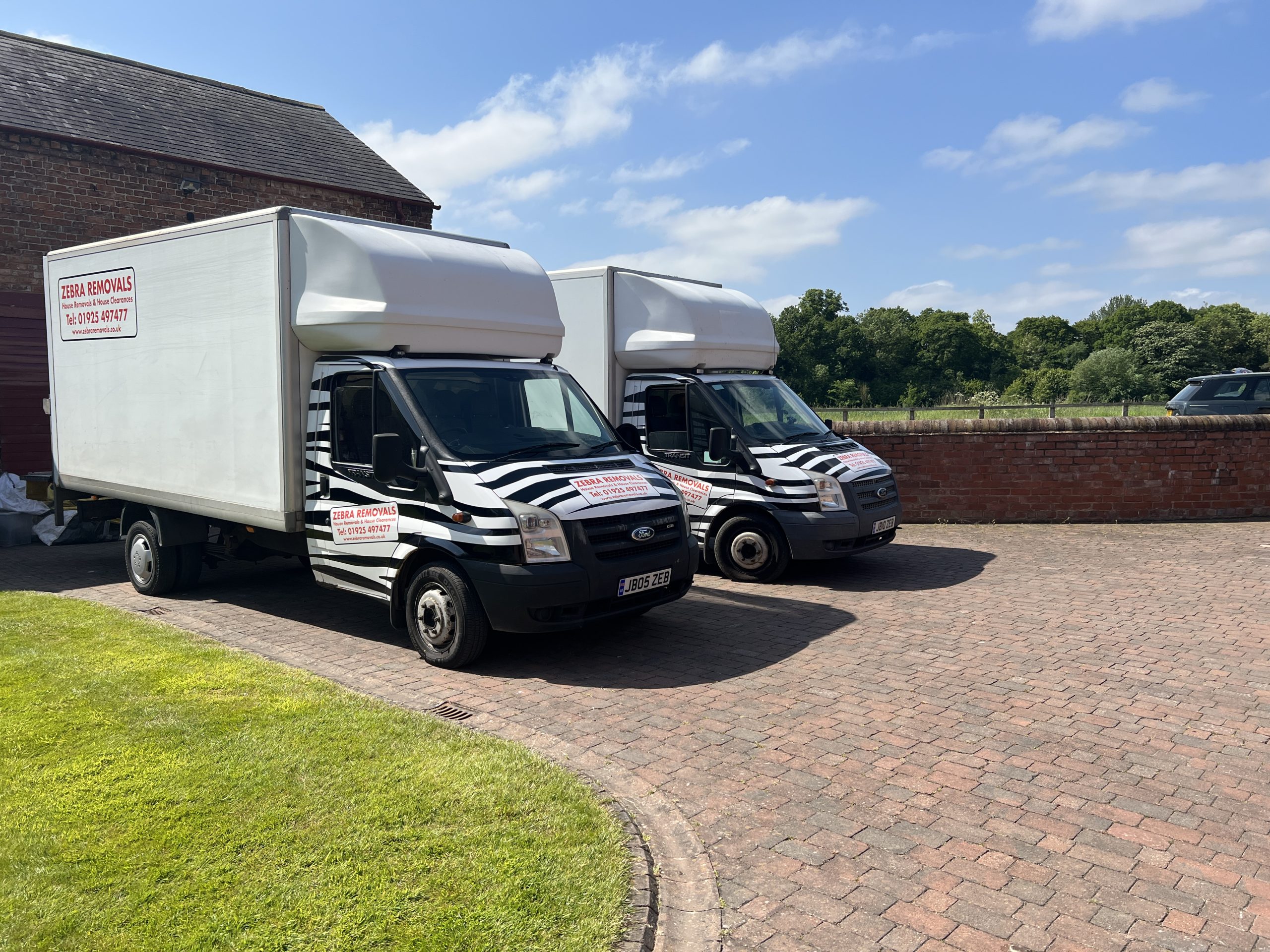 Zebra Removals vans during a Warrington house removal